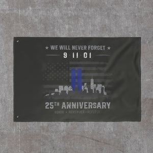 9/11 memorial flag laid flat: greyscale American flag with blue Twin Towers over the skyline and 25th Anniversary