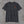 Front of the charcoal Honor the Tradition tee with the TCA monogram on the left chest