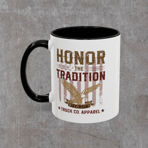 Honor the Tradition mug with the black C-handle on the left, HONOR THE TRADITION lettering above the gold eagle