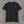 Front of the black Honor the Tradition tee with the small TCA monogram and EST. 2026 on the left chest