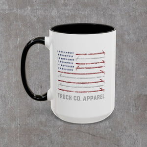 Angled view of the Truck Co. Hook Flag accent mug, black interior visible at the rim