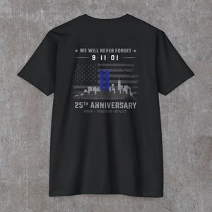 Black We Will Never Forget tee, back print: greyscale flag and skyline with the Twin Towers standing in blue