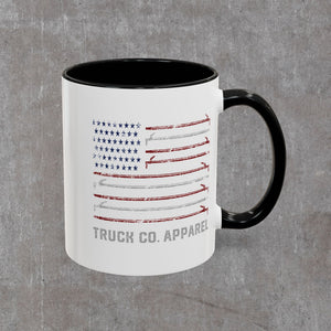 Truck Co. Hook Flag mug, white ceramic with black interior and handle, roof-hook American flag wrapped around the body