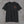 Front of the black Truck Co. Apparel tee with the round TCA ladder-and-hook crest on the left chest
