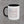 Hook Flag mug seen with the black C-handle on the left, Truck Co. Apparel lettering beneath the flag