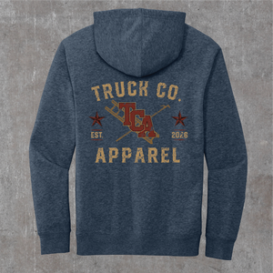 Back of the heathered navy Truck Co. Apparel vintage logo hoodie, TCA crest between a ladder and pike pole