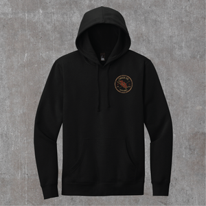 Front of the black Truck Co. Apparel hoodie with the round TCA ladder-and-hook crest on the left chest