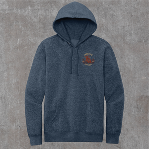 Heathered navy 9/11 memorial hoodie, front with a small rust-red Truck Co. Apparel skyline crest on the chest
