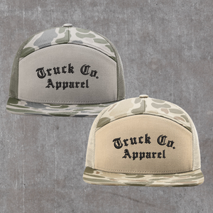 Both Truck Co. Apparel camo trucker hats side by side, Marsh Duck Camo in loden and Harvest Duck Camo in sandstone