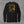 Headless Truckman long sleeve tee in Black, back view with full-back print of a headless firefighter holding a flaming jack-o'-lantern on an aerial ladder above a burning roof