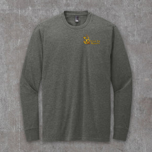 Headless Truckman long sleeve tee in Heathered Charcoal, front view with Truck Co. Apparel flaming jack-o'-lantern logo on the left chest