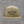 Richardson 168 seven-panel trucker hat in Pale Khaki with loden mesh, Truck Co. Apparel embroidered in black blackletter across the front panel